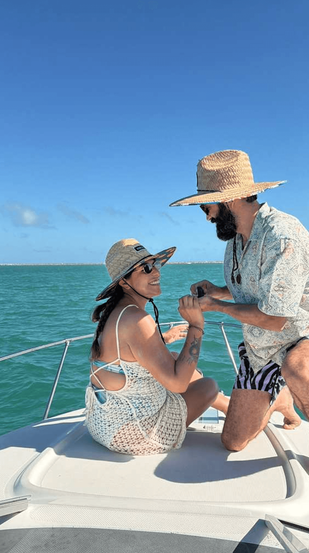 A couple on a boat on the gulf near Yucatan